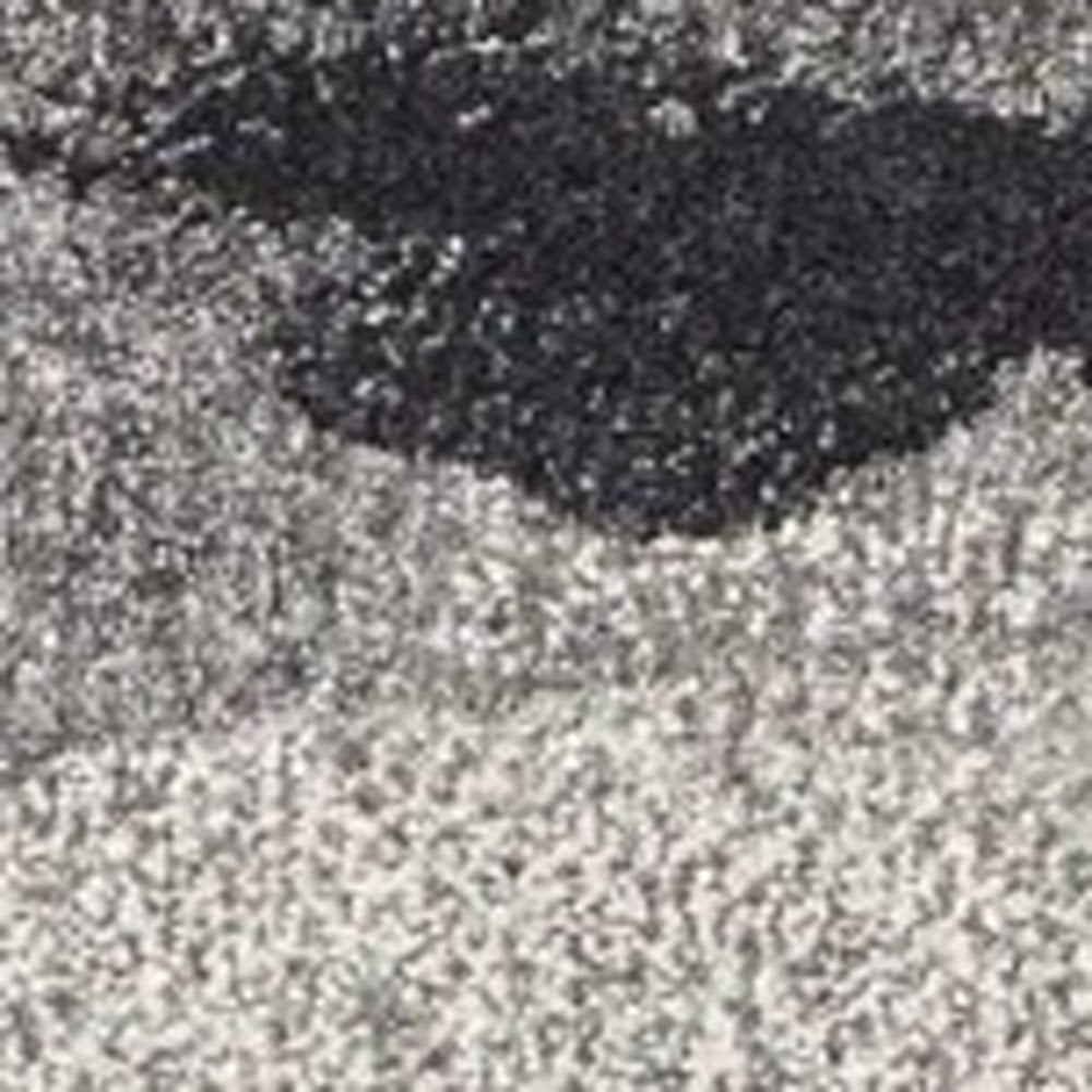5' X 8' Gray Black And Ivory Abstract Area Rug