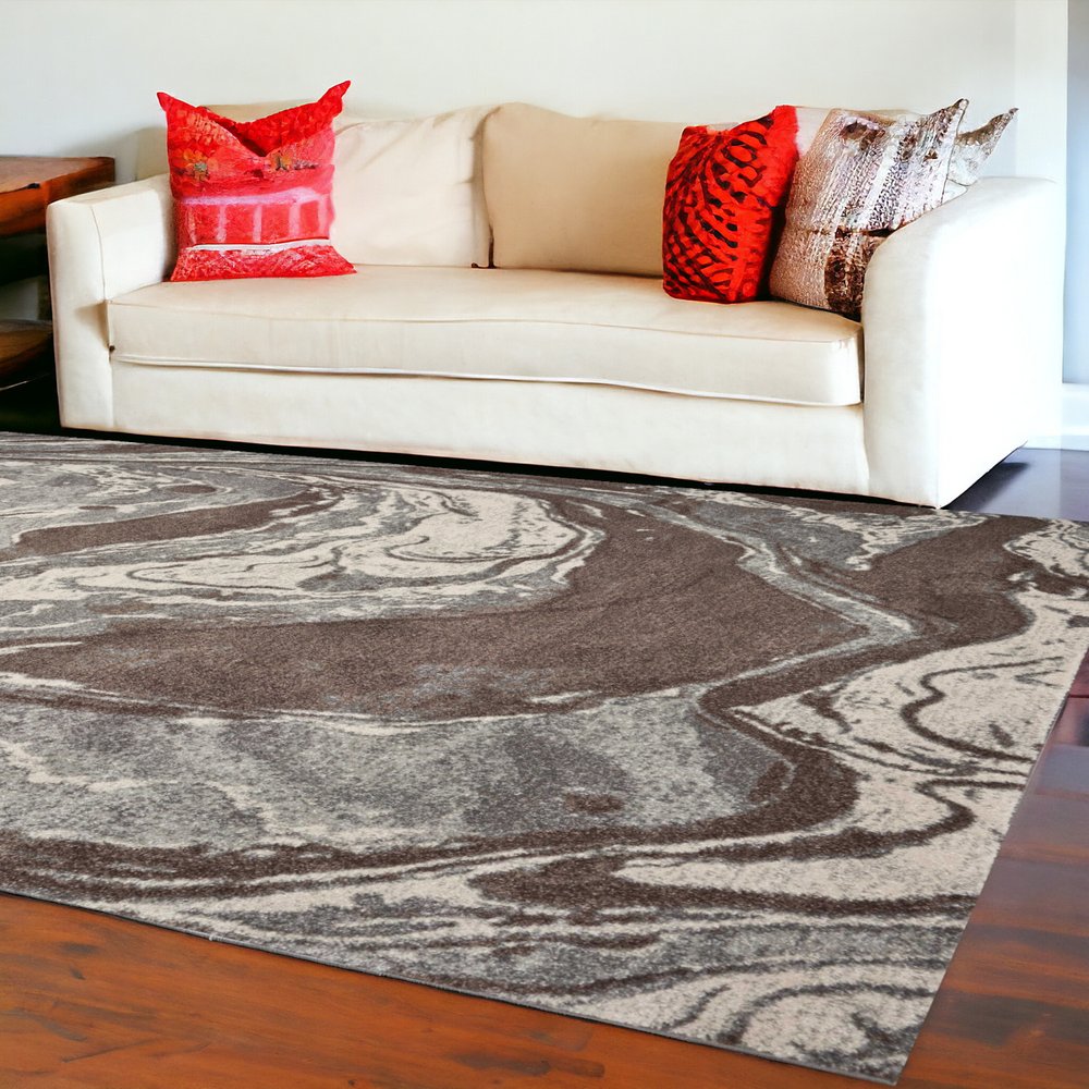 7' X 10' Brown And Ivory Abstract Area Rug