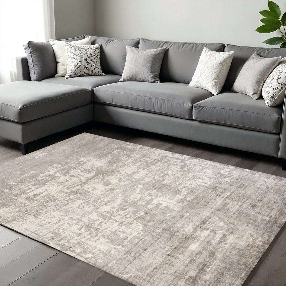 8' X 11' Beige And Ivory Abstract Hand Loomed Area Rug