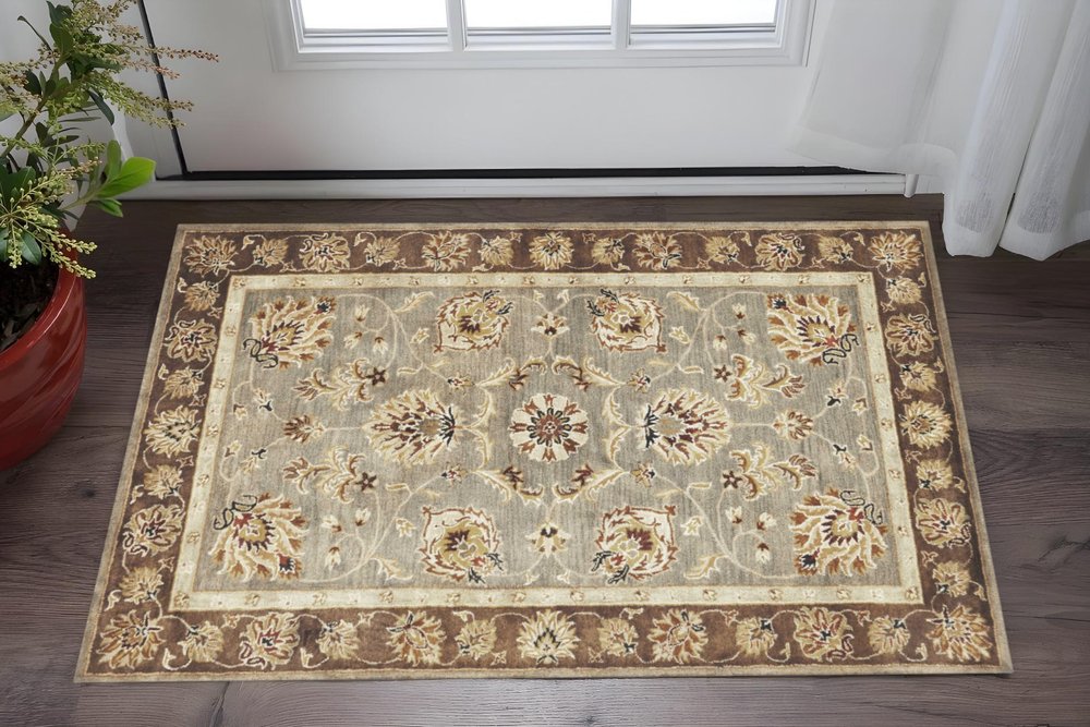 3' X 5' Gray Brown And Ivory Wool Floral Medallion Hand Tufted Area Rug