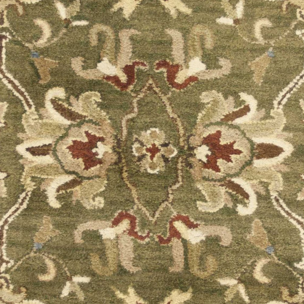 5' X 8' Green Red And Ivory Wool Floral Medallion Hand Tufted Area Rug