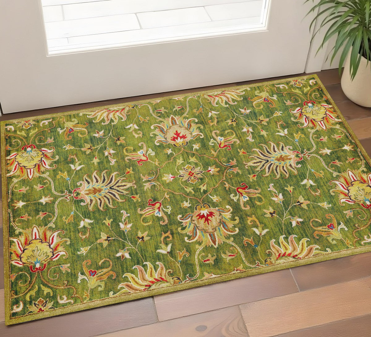 5' X 8' Green Red And Ivory Wool Floral Medallion Hand Tufted Area Rug