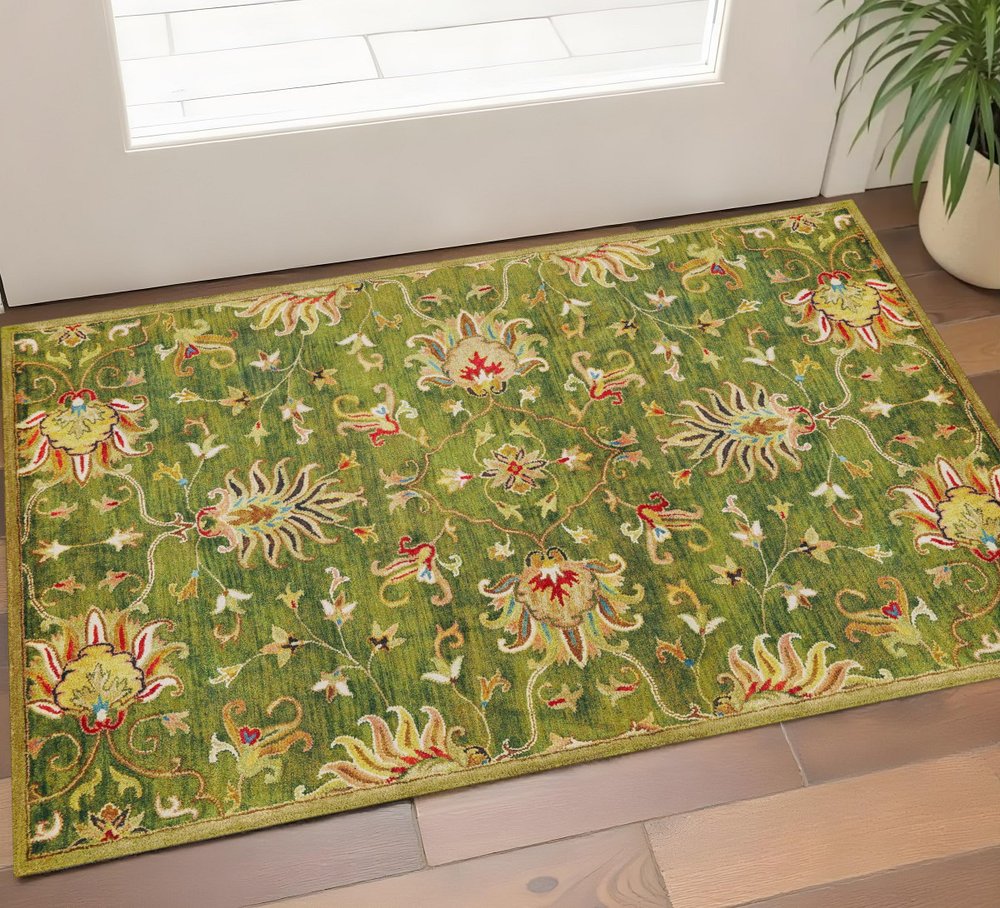 5' X 8' Green Red And Ivory Wool Floral Medallion Hand Tufted Area Rug