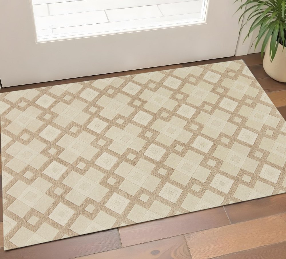 5' X 8' Ivory And Brown Wool Geometric Hand Tufted Area Rug