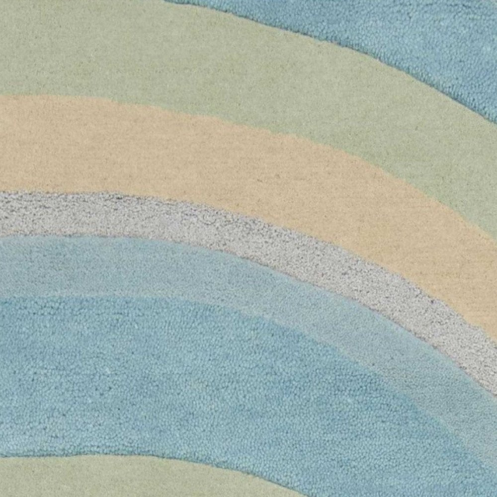 5' X 8' Blue Beige And Green Wool Abstract Hand Tufted Area Rug