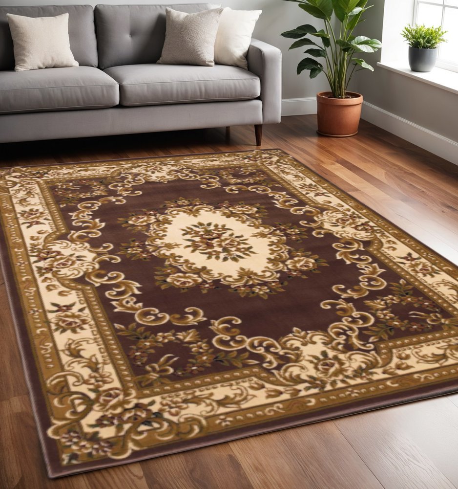 5' X 8' Plum And Ivory Floral Medallion Area Rug