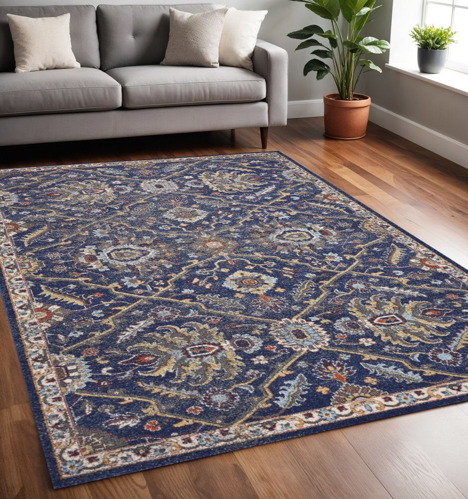 5' X 8' Royal Blue Gold And Gray Medallion Area Rug