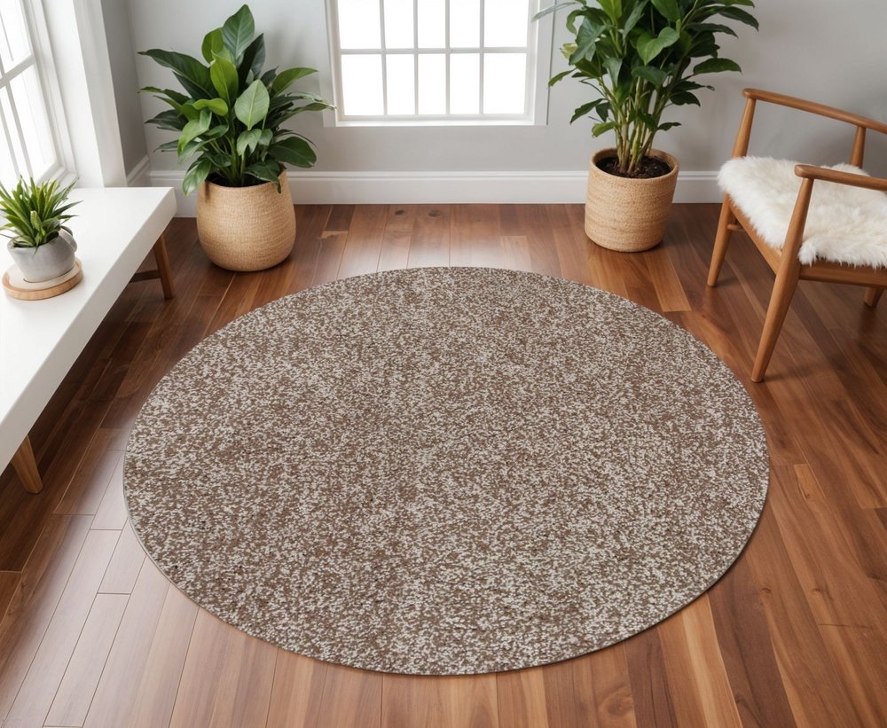 5' X 7' Beige And Brown Abstract Shag Hand Woven Area Rug