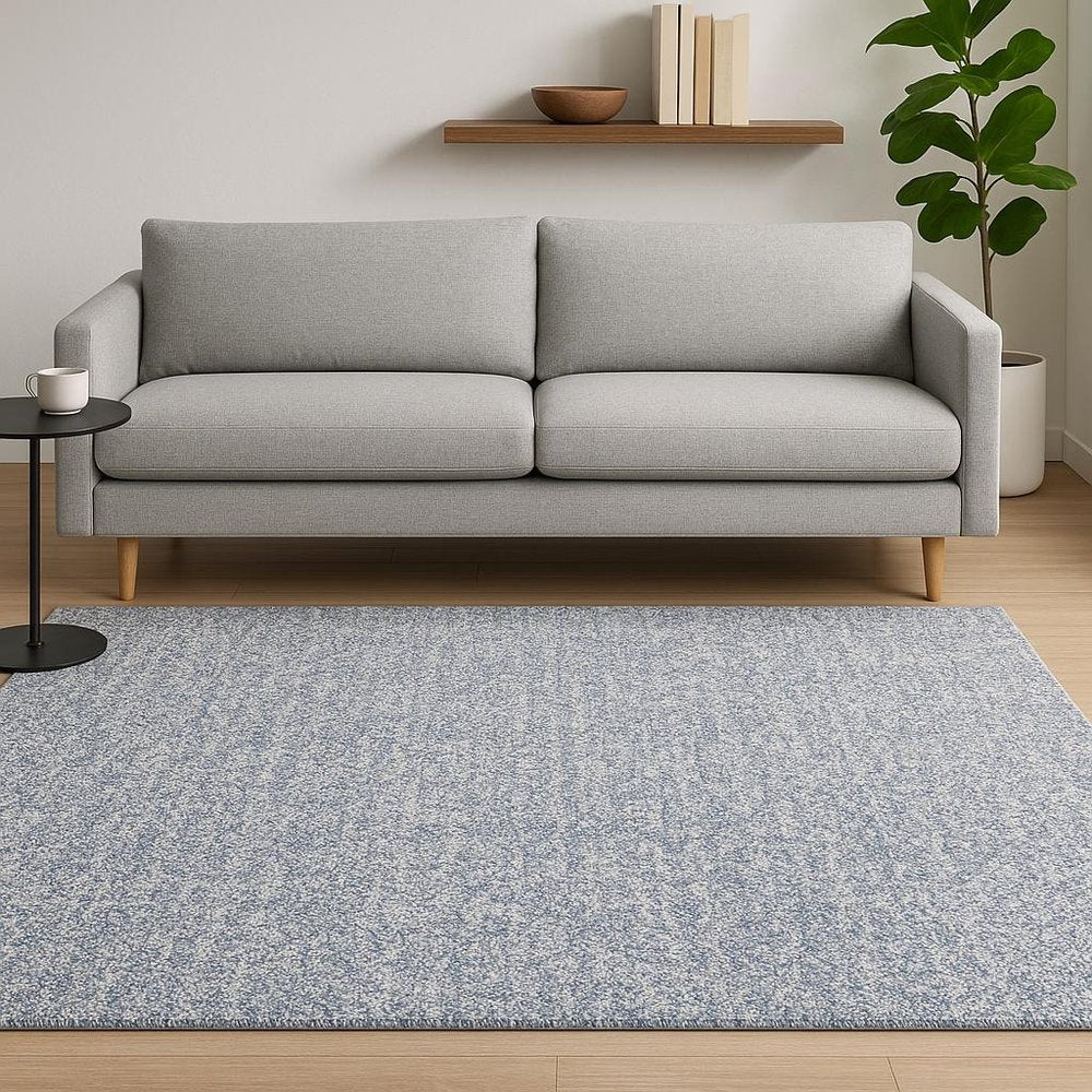 5' X 7' Slate Blue And Ivory Abstract Shag Hand Woven Area Rug