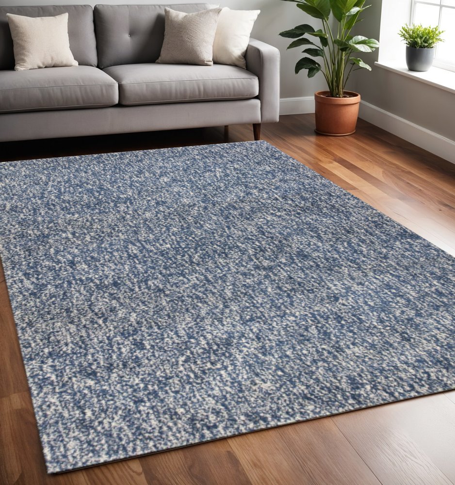 8' X 11' Indigo And Ivory Abstract Shag Hand Woven Area Rug