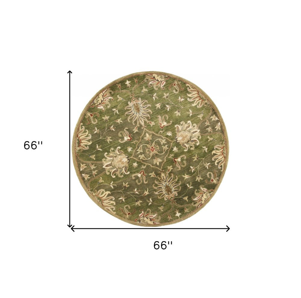 5' X 8' Green Red And Ivory Wool Floral Medallion Hand Tufted Area Rug