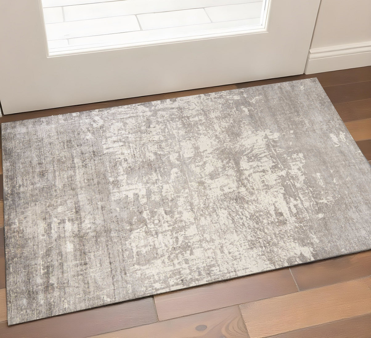 8' X 11' Beige And Ivory Abstract Hand Loomed Area Rug