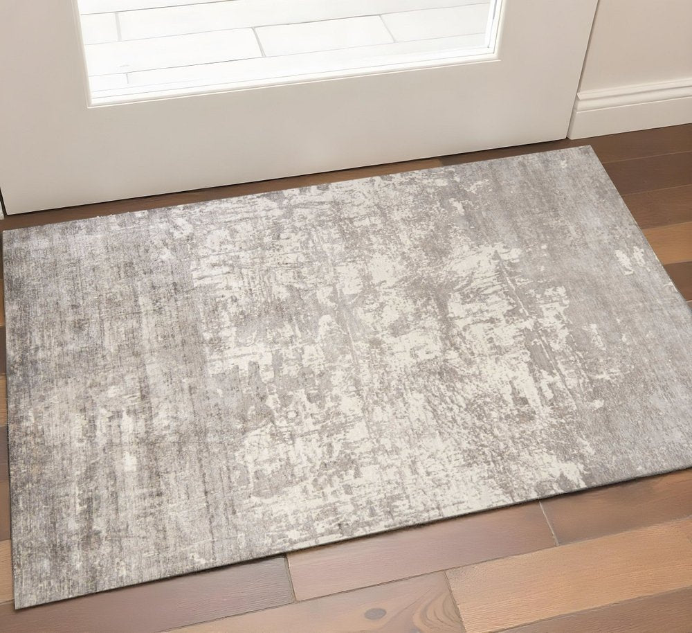 8' X 11' Beige And Ivory Abstract Hand Loomed Area Rug