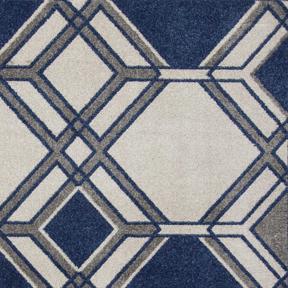 5' X 8' Blue Ivory And Gray Geometric Area Rug