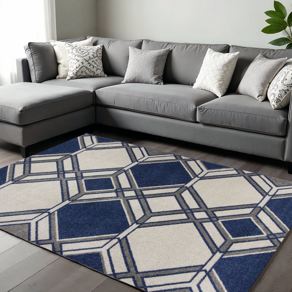 5' X 8' Blue Ivory And Gray Geometric Area Rug