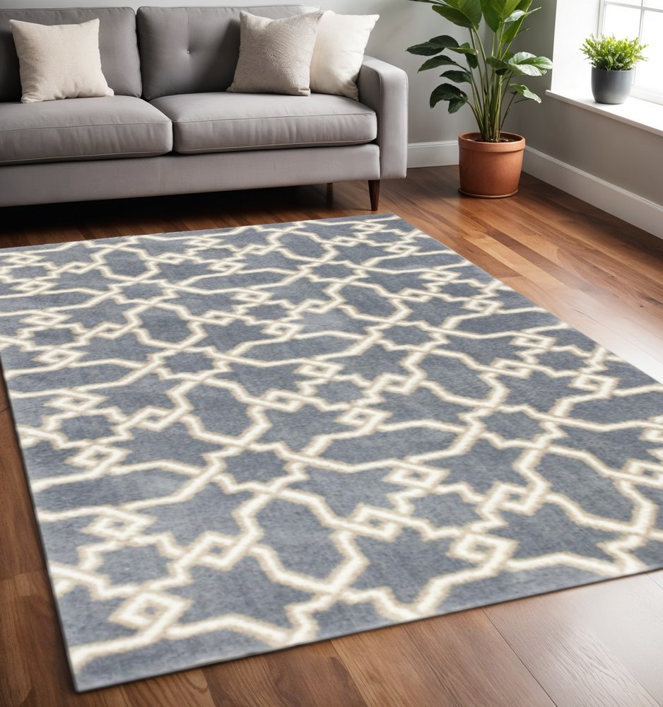5' X 8' Slate Blue And Ivory Geometric Area Rug