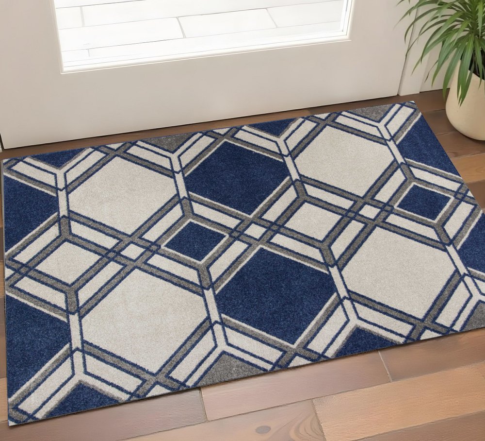 5' X 8' Blue Ivory And Gray Geometric Area Rug