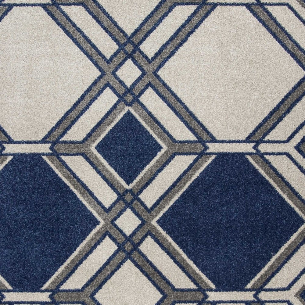 5' X 8' Blue Ivory And Gray Geometric Area Rug