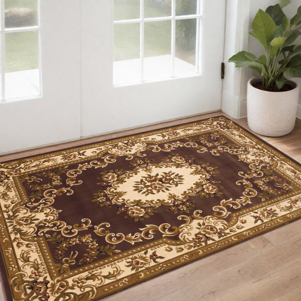 5' X 8' Plum And Ivory Floral Medallion Area Rug