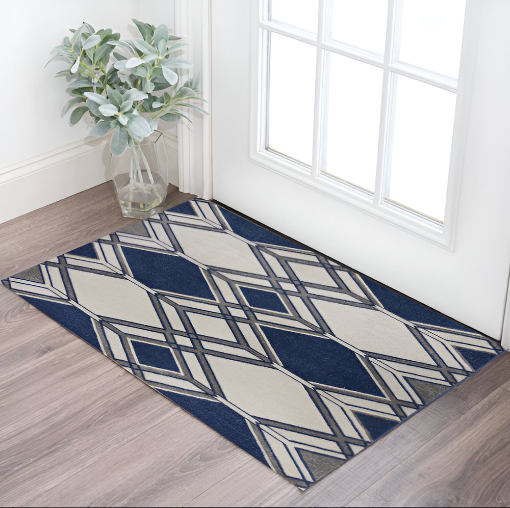 5' X 8' Blue Ivory And Gray Geometric Area Rug