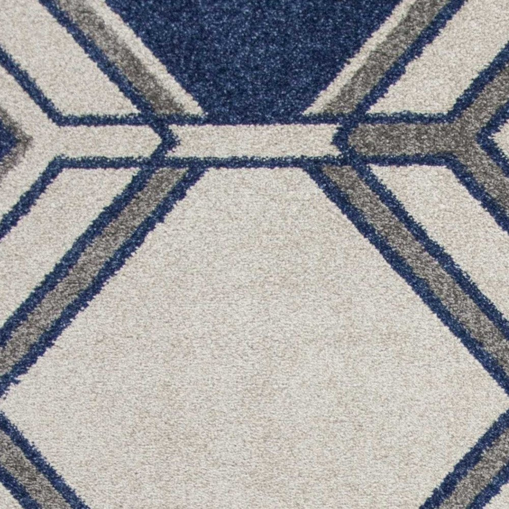 5' X 8' Blue Ivory And Gray Geometric Area Rug