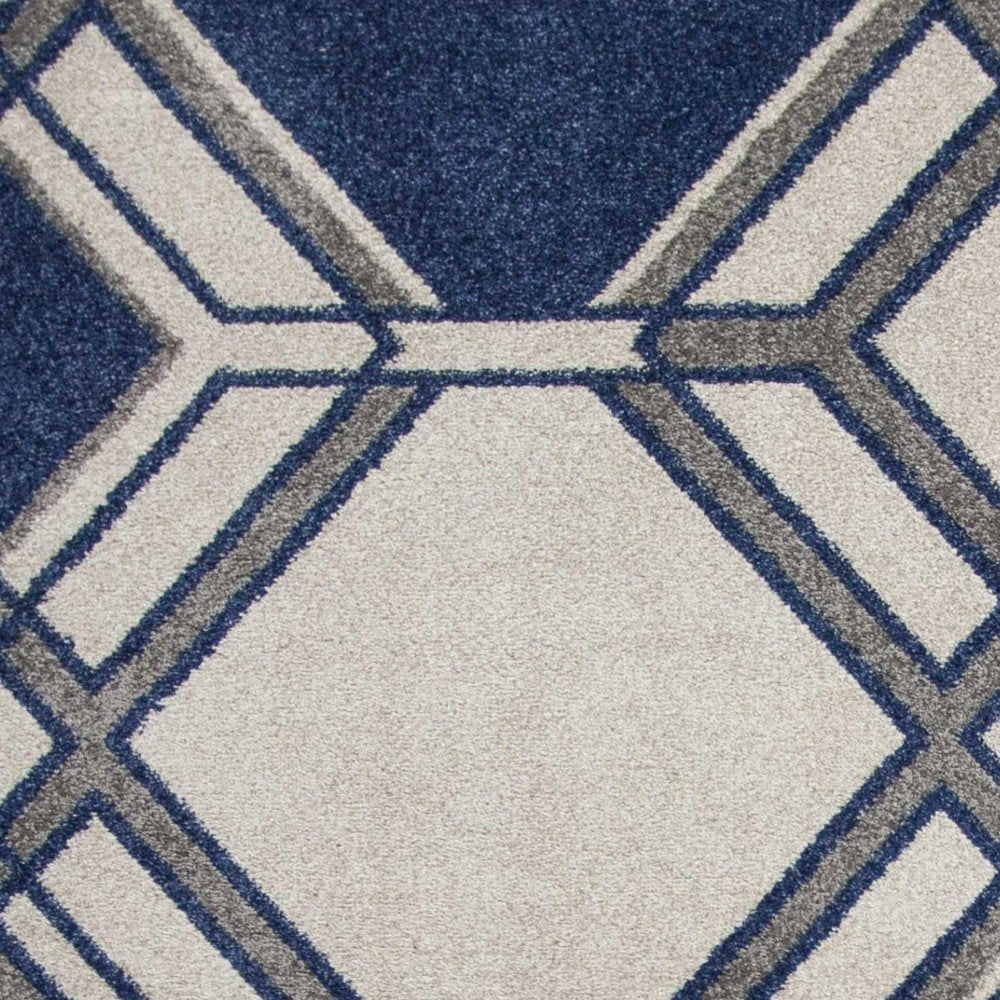 5' X 8' Blue Ivory And Gray Geometric Area Rug