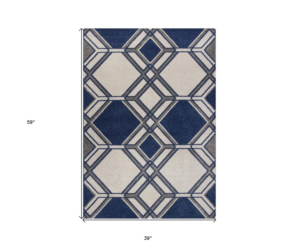 5' X 8' Blue Ivory And Gray Geometric Area Rug