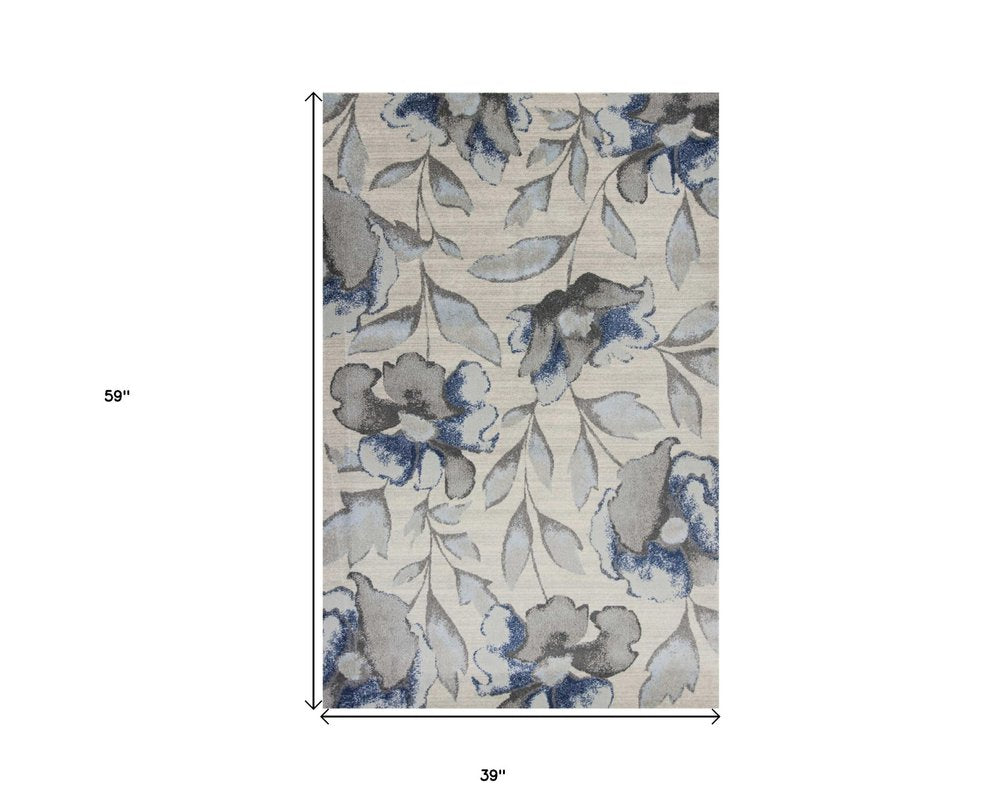 9' X 13' Ivory Blue And Gray Floral Vines Area Rug