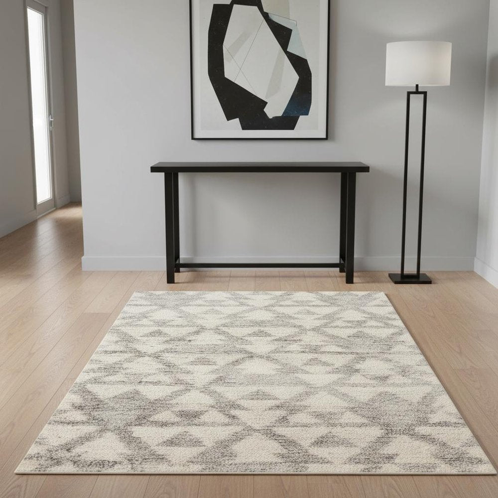 4' X 6' Ivory And Gray Geometric Distressed Area Rug