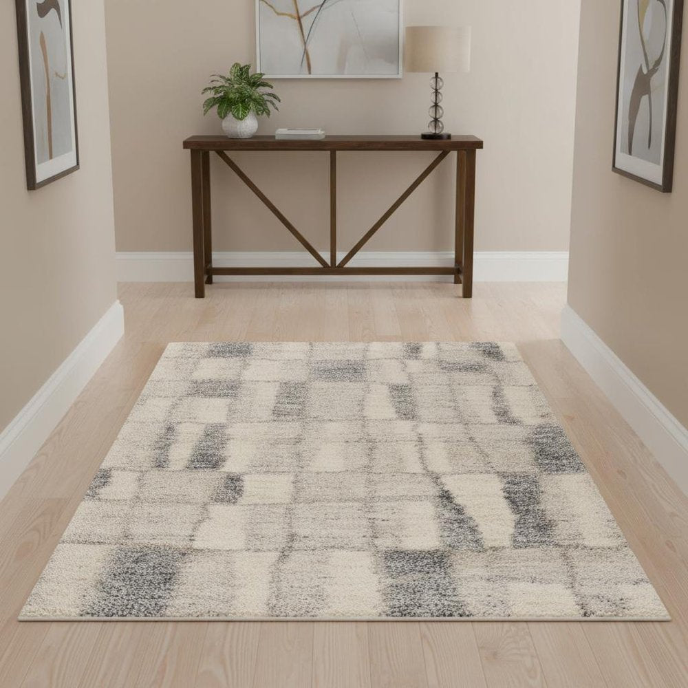 4' X 6' Ivory And Blue Abstract Geometric Distressed Area Rug