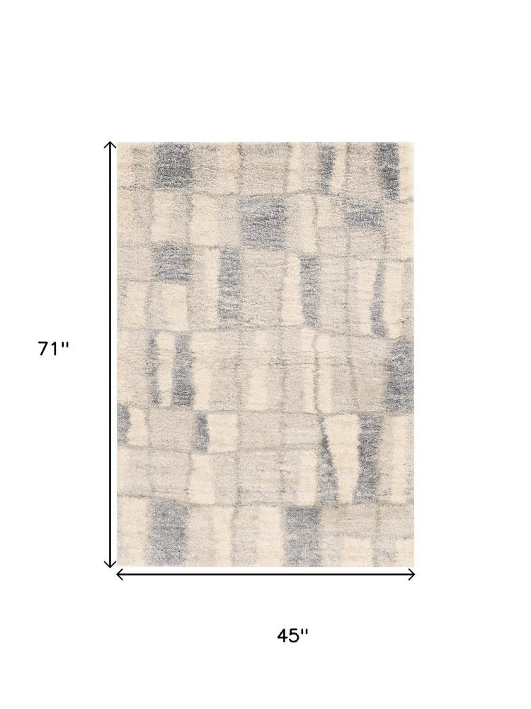 4' X 6' Ivory And Blue Abstract Geometric Distressed Area Rug