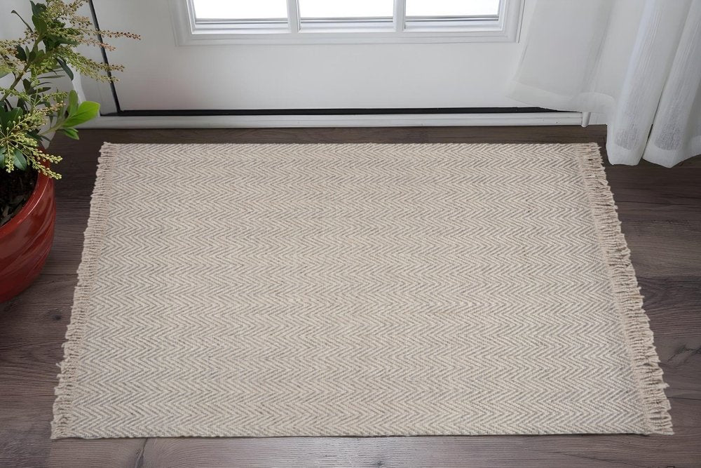 8' X 10' Beige And Gray Wool Chevron Hand Woven Area Rug With Fringe