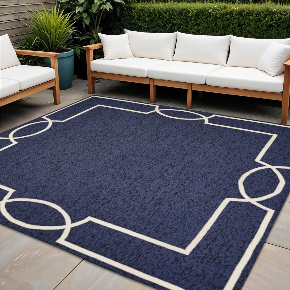 7' X 10' Blue And Ivory Geometric Hand Hooked Area Rug