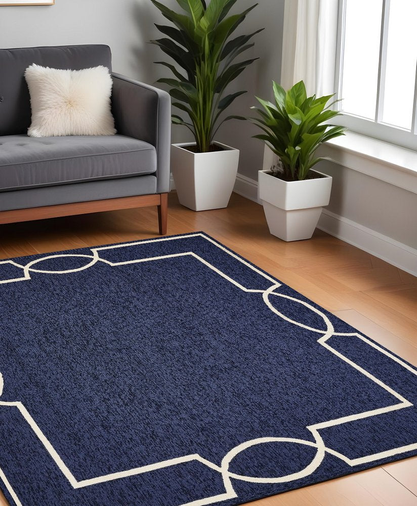 7' X 10' Blue And Ivory Geometric Hand Hooked Area Rug