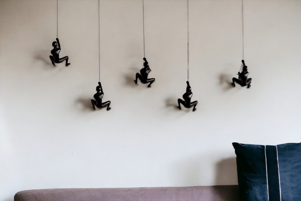 Set of Five Black Resin Climbing Man Hanging Dimensional Sculpture
