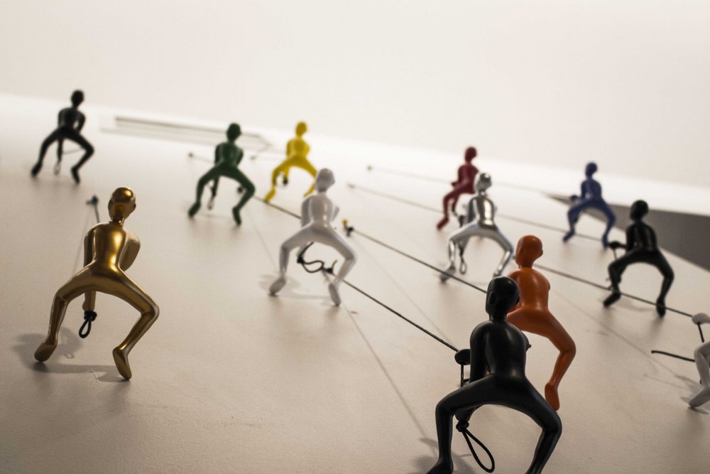 Set of Nine Rainbow Resin Climbing Man Hanging Dimensional Sculpture