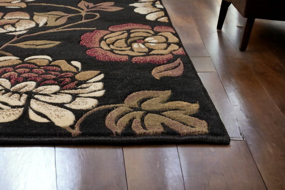 5' X 8' Black Tan And Ivory Floral Area Rug