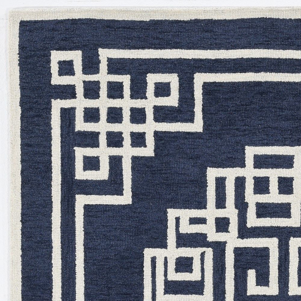 9' X 12' Navy Blue And Ivory Wool Geometric Hand Tufted Area Rug
