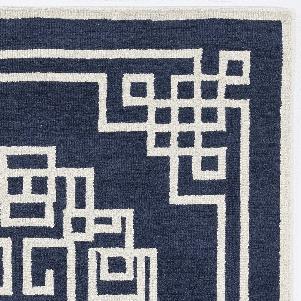9' X 12' Navy Blue And Ivory Wool Geometric Hand Tufted Area Rug