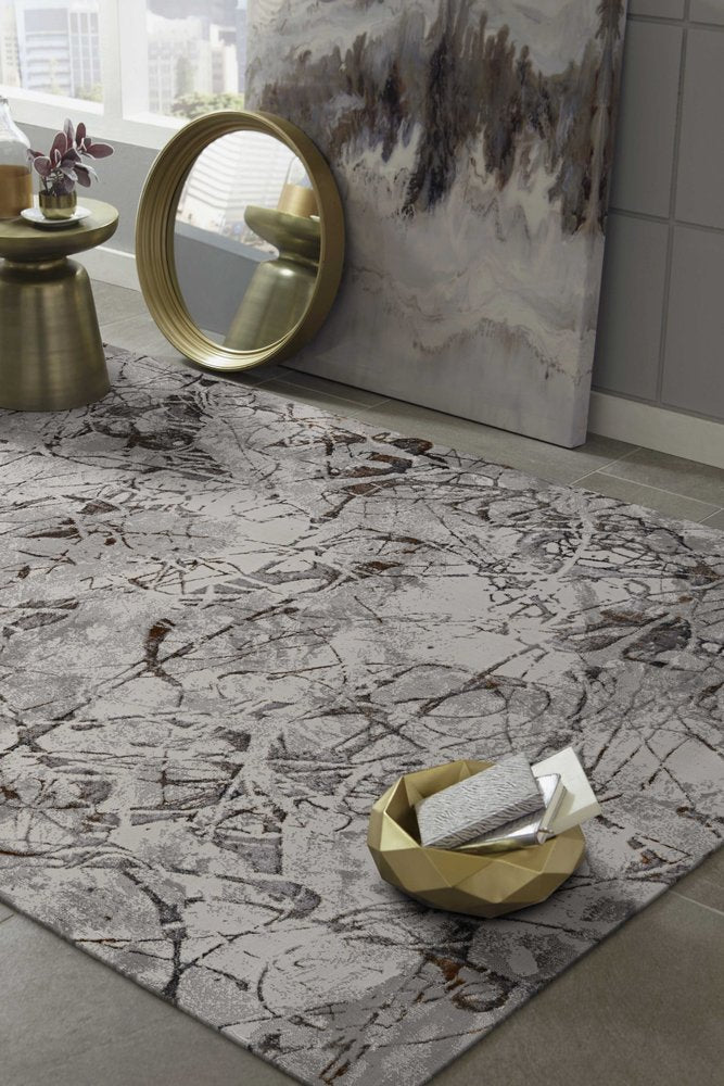 5' X 8' Ivory Gray And Brown Abstract Area Rug