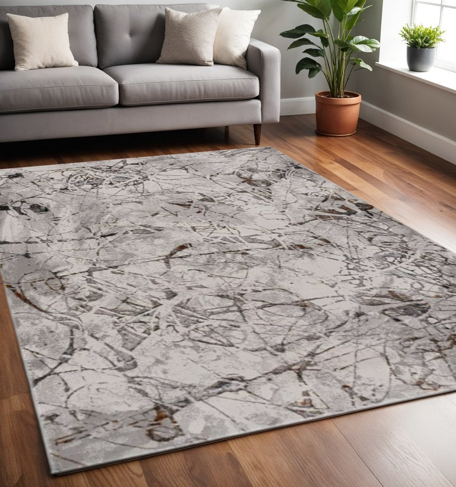 5' X 8' Ivory Gray And Brown Abstract Area Rug
