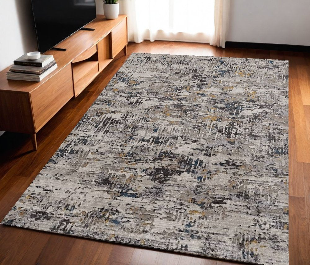 5' X 8' Gray Black And Gold Abstract Distressed Area Rug