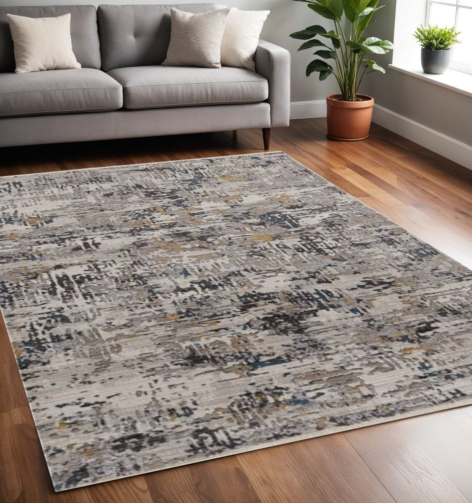 5' X 8' Gray Black And Gold Abstract Distressed Area Rug
