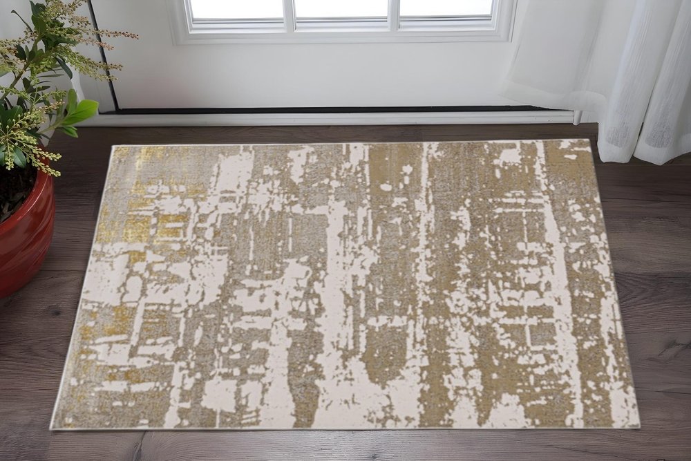8' X 11' Ivory Taupe And Gold Abstract Area Rug