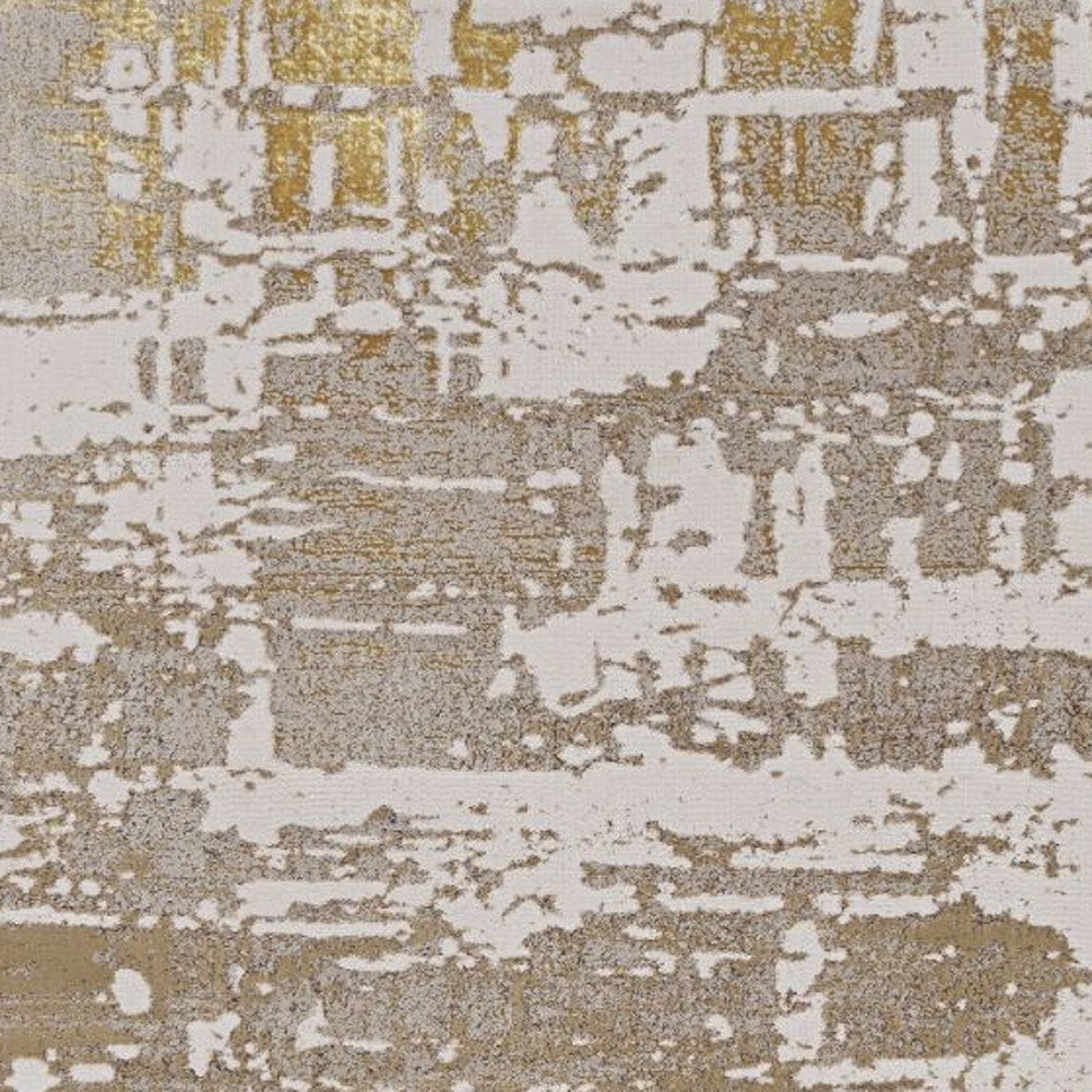 8' X 11' Ivory Taupe And Gold Abstract Area Rug