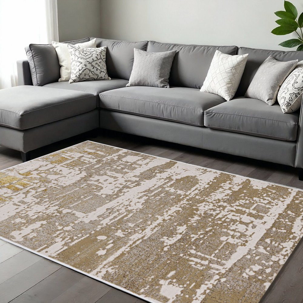 8' X 11' Ivory Taupe And Gold Abstract Area Rug