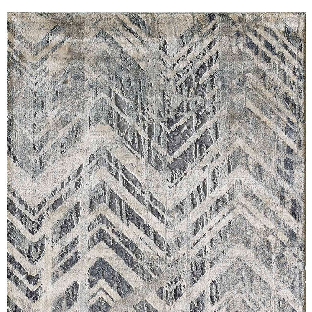 9' X 13' Dark Gray And Ivory Chevron Area Rug