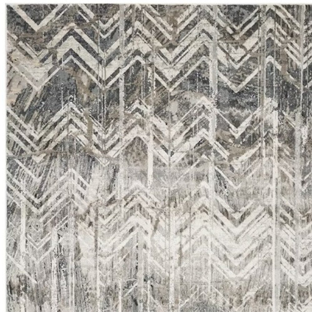 9' X 13' Dark Gray And Ivory Chevron Area Rug
