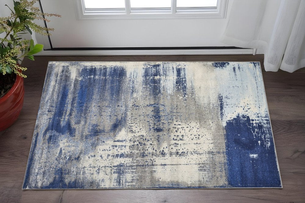 5' X 7' Blue Ivory And Gray Abstract Area Rug