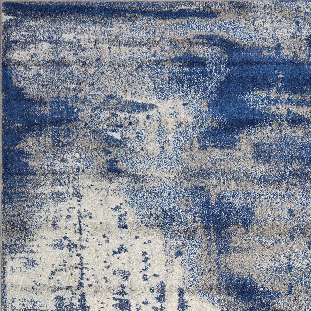 5' X 7' Blue Ivory And Gray Abstract Area Rug